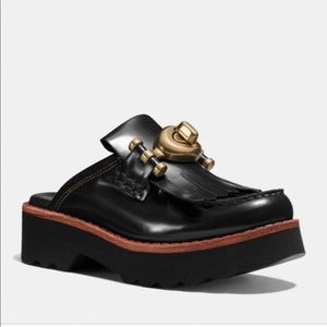 Coach turn lock creeper slide